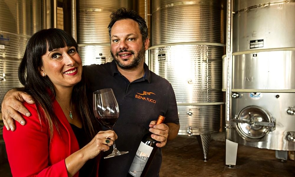 Elena Fucci and Andrea enjoying a glass of Titolo – Aglianico del Vulture, celebrating their passion for winemaking.